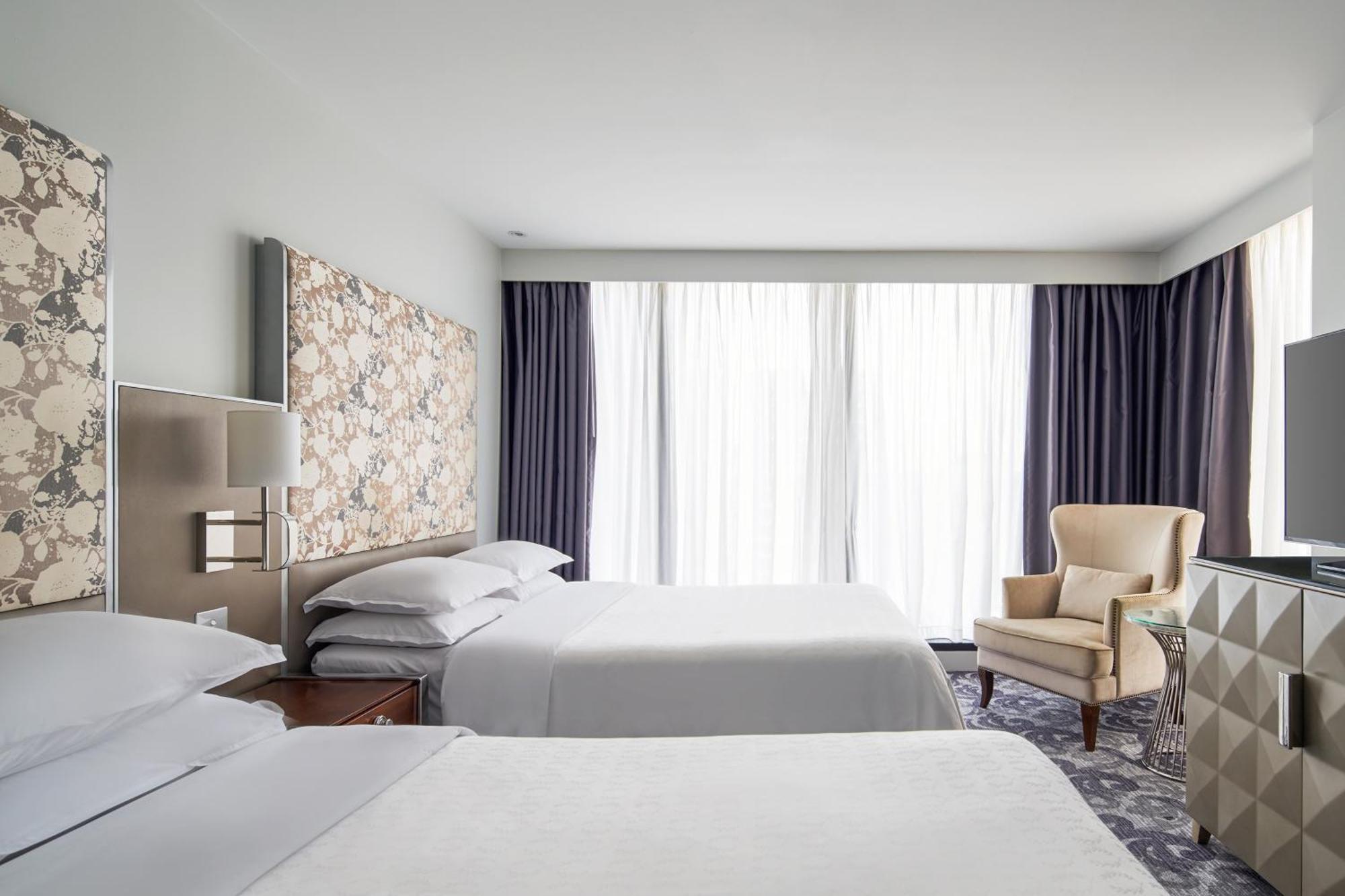 Sheraton Melbourne Hotel Exterior foto A bedroom at the hotel